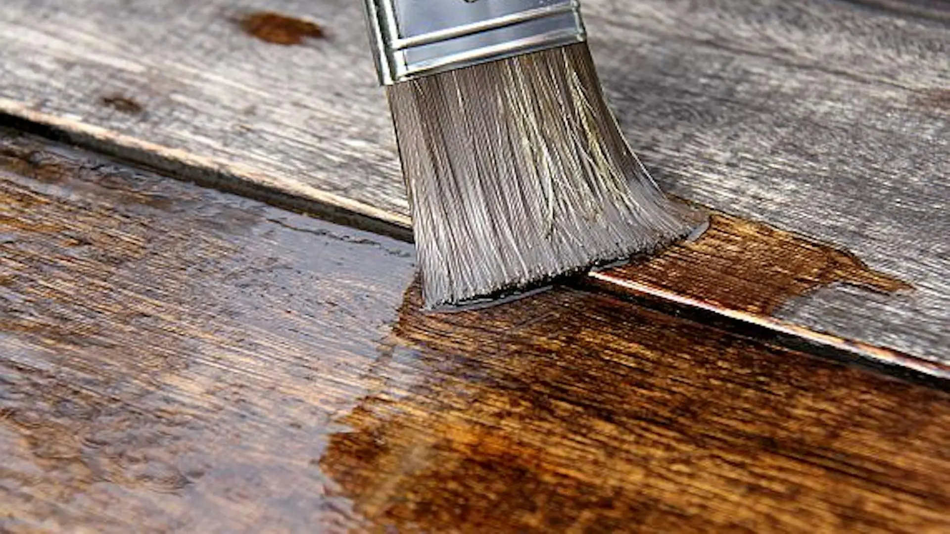 Brush with glaze on wood